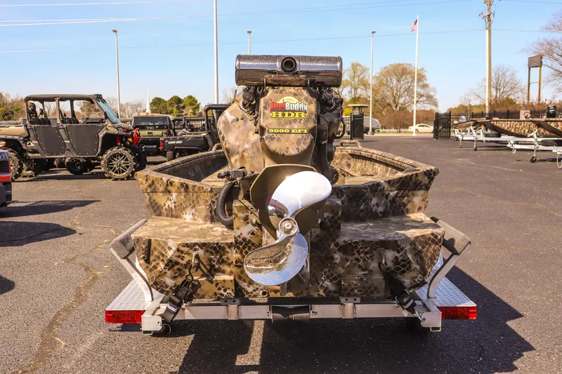 Slide: The Image of 2025 Excel 1751 F4 Shallow Water boat with camo design and powerful rear motor. - 6