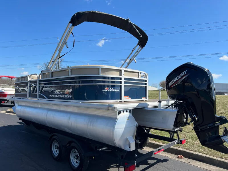 Slide: The Image of 2023 Sun Tracker Party Barge 20 DLX pontoon boat with Mercury outboard motor. - 7