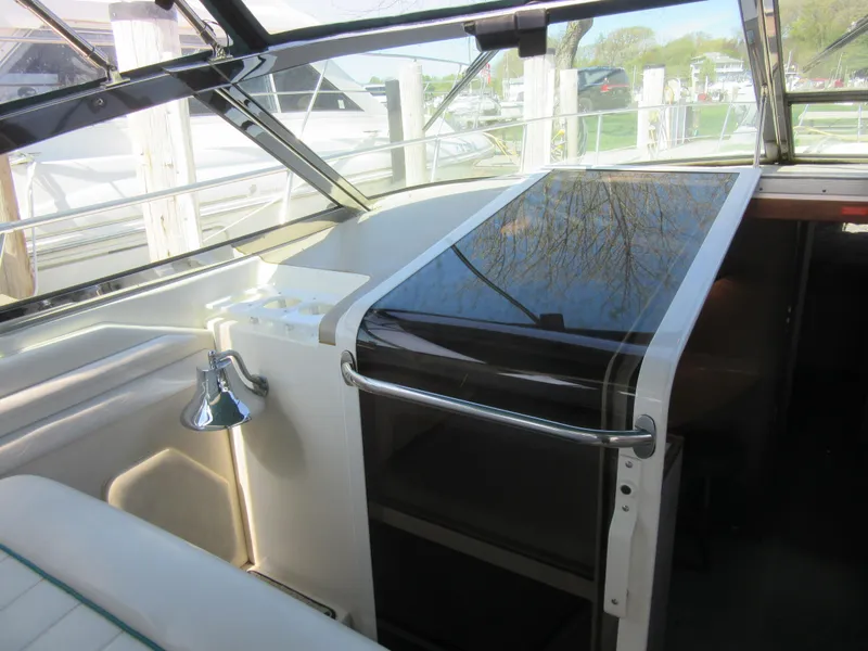 Slide: The Image of 1995 Sea Ray 400 Express Cruiser interior with sleek design and modern amenities. - 26