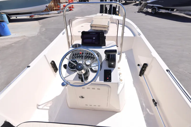 Slide: The Image of 2020 Carolina Skiff 192 JLS boat interior with steering console and navigation equipment. - 3