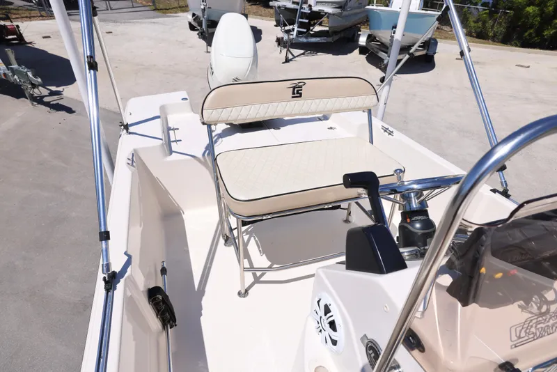 Slide: The Image of 2020 Carolina Skiff 192 JLS boat interior with seating and steering console. - 5