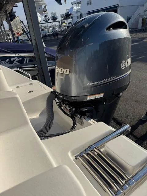 Slide: The Image of 2022 Sea Hunt Ultra 234 boat with Yamaha 200 outboard motor. - 7