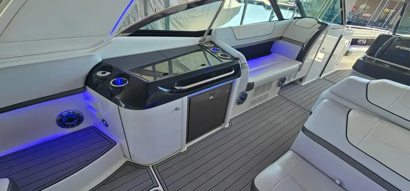 Slide: The Image of 2021 Formula 350 CBR boat interior with sleek seating and modern amenities. - 10