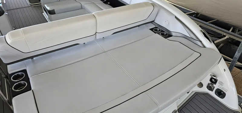 Slide: The Image of 2021 Formula 350 CBR boat interior with spacious seating and cup holders. - 11