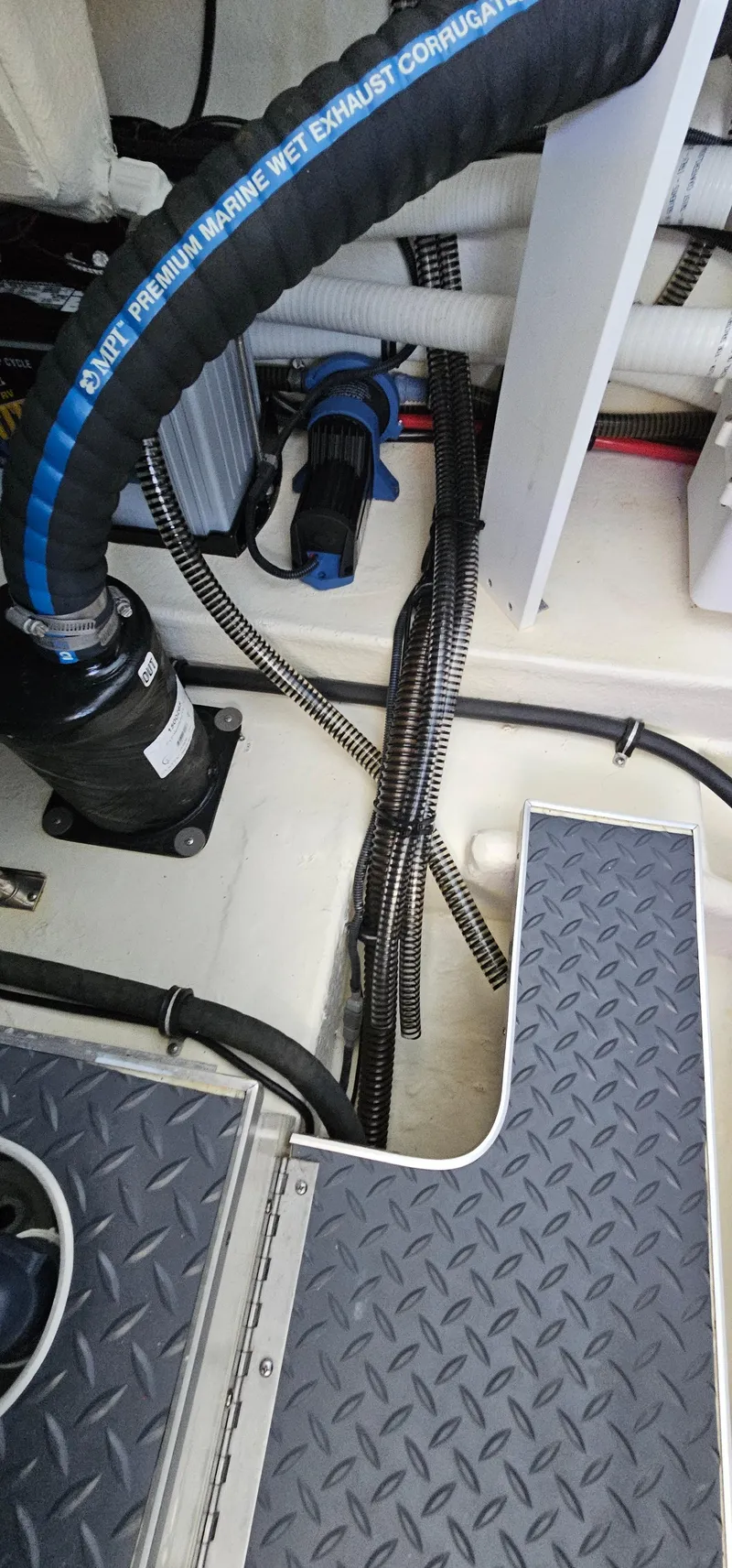 Slide: The Image of 2021 Formula 350 CBR engine compartment with marine exhaust components and wiring. - 30