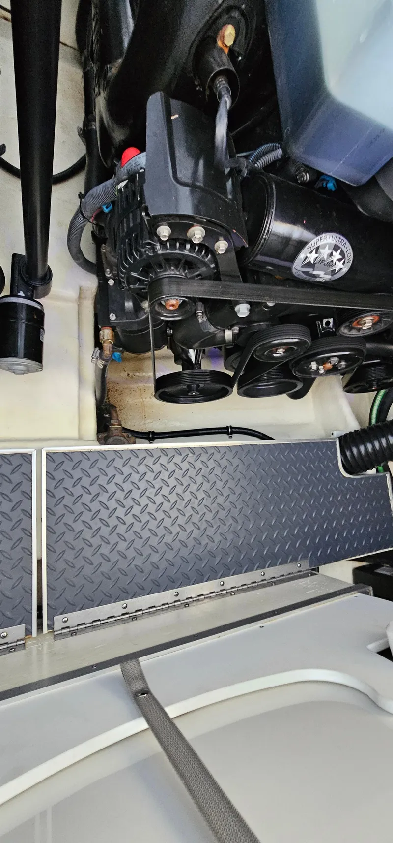 Slide: The Image of Engine compartment of a 2021 Formula 350 CBR boat, showcasing mechanical components. - 33