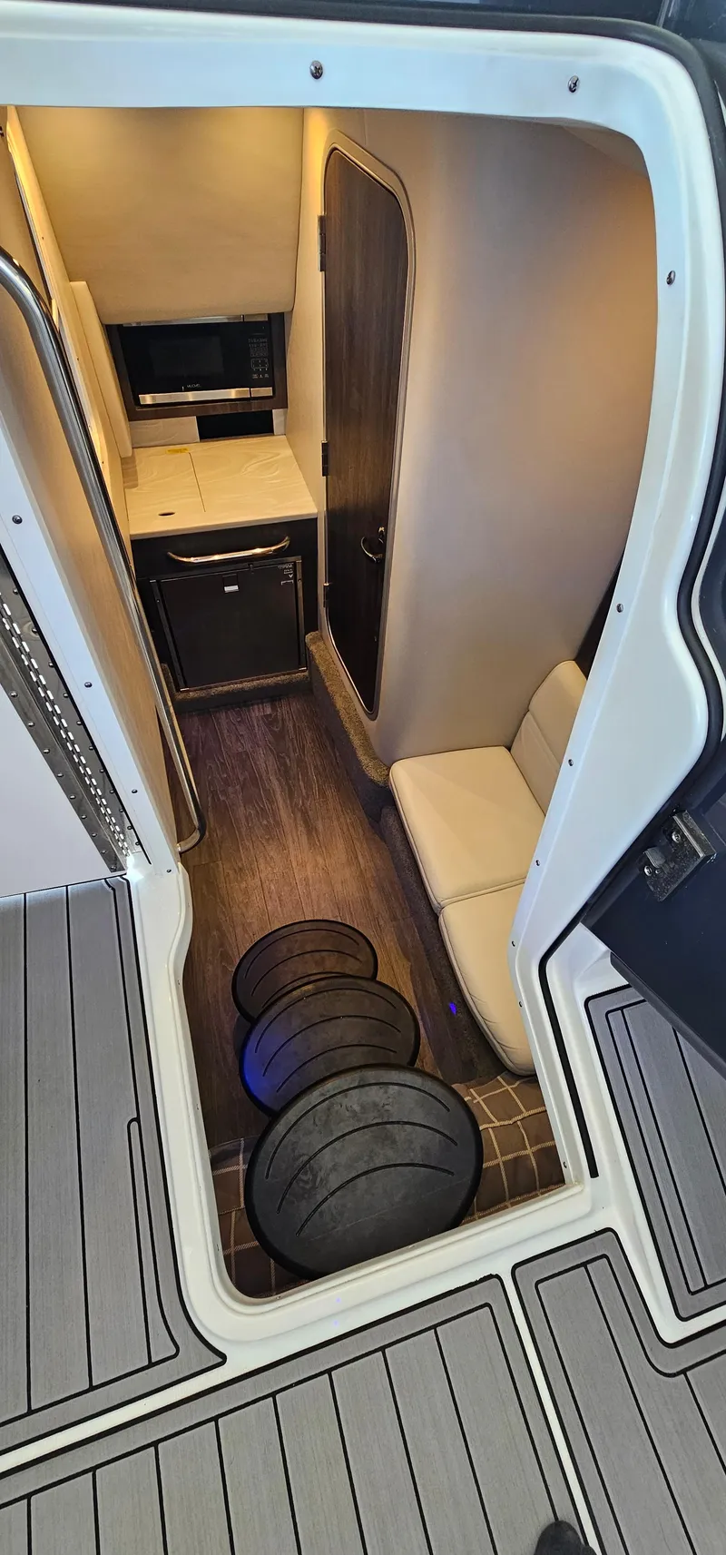 Slide: The Image of 2021 Formula 350 CBR cabin interior with seating, kitchenette, and modern design. - 42