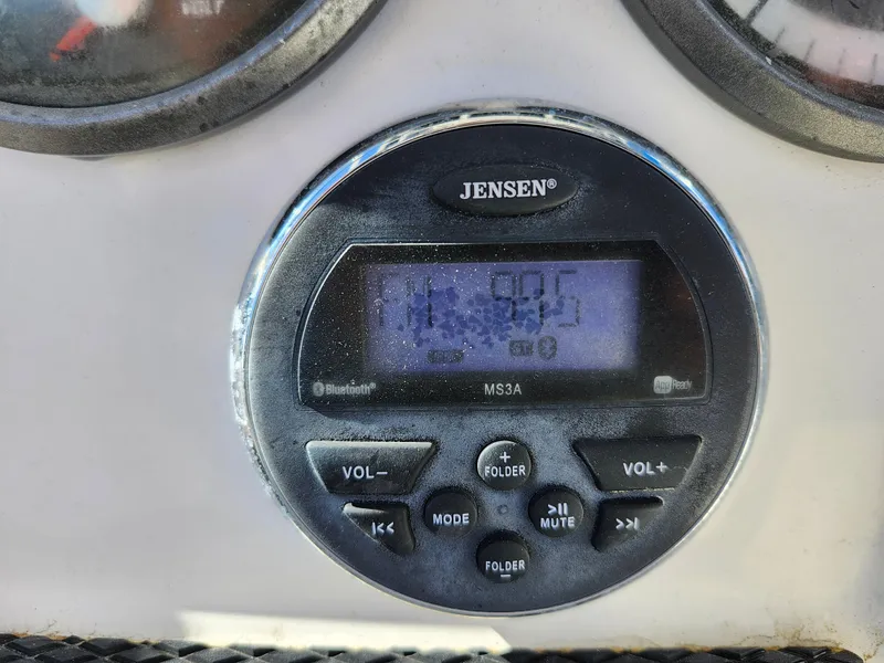 Slide: The Image of Jensen MS3A stereo system on 2018 Bayliner Element F21 boat dashboard. - 23