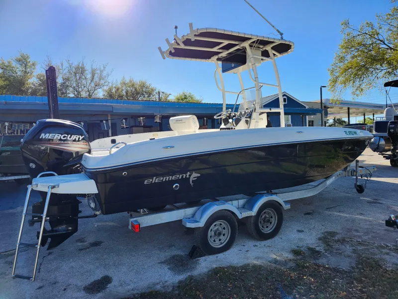 Slide: The Image of 2018 Bayliner Element F21 boat on trailer with Mercury outboard motor. - 6