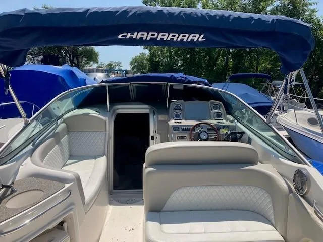 Slide: The Image of 2013 Chaparral 290 Signature boat interior with canopy and seating. - 4