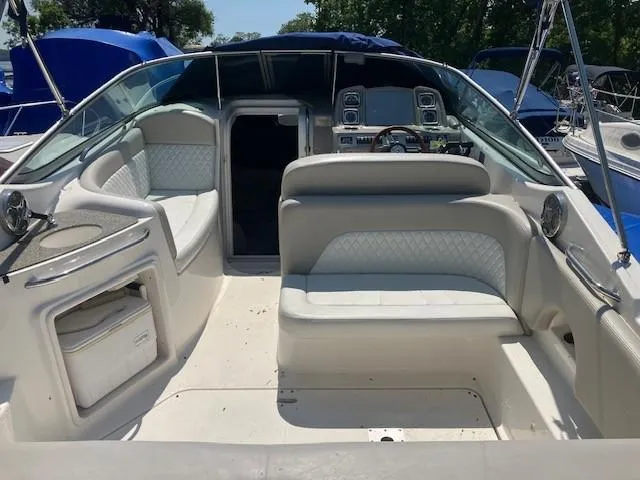 Slide: The Image of 2013 Chaparral 290 Signature boat interior with seating and dashboard. - 5