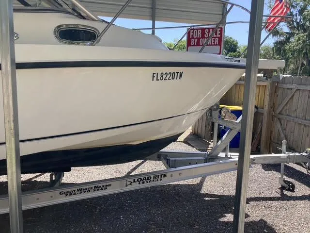 Slide: The Image of 2008 Boston Whaler 235 Conquest boat on trailer, for sale by owner. - 35