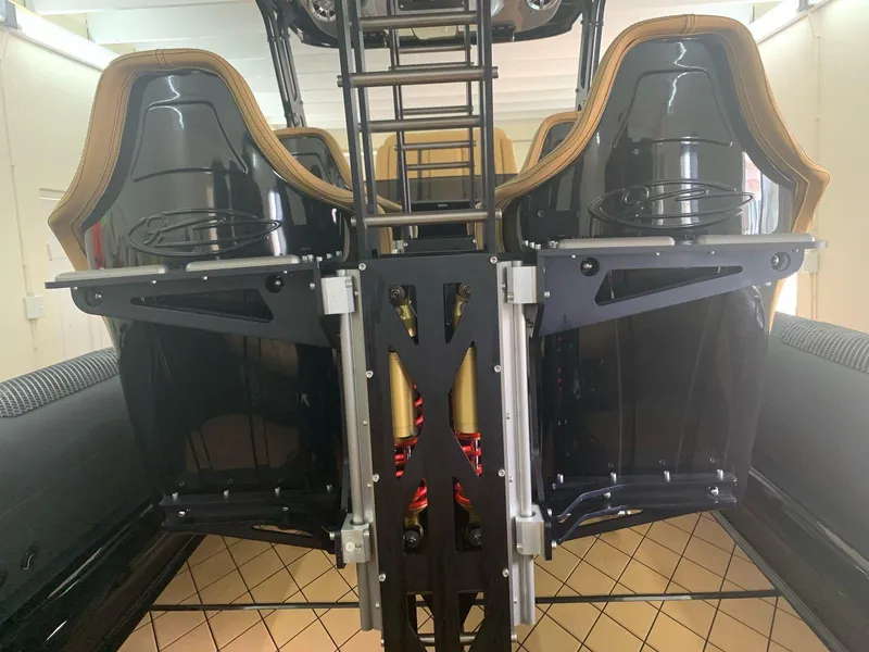 Slide: The Image of 2018 Bernico RX10 interior with sleek black seats and modern design elements. - 10