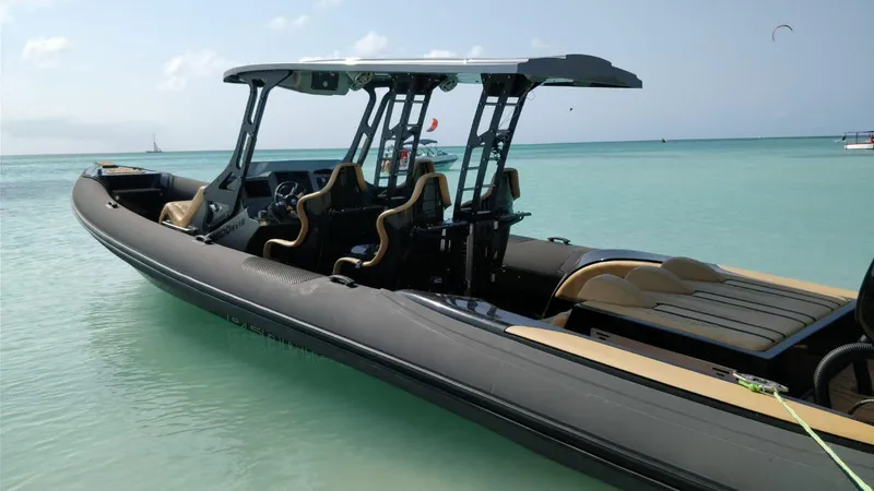 Slide: The Image of 2018 Bernico RX10 boat in clear turquoise water, featuring sleek design and modern seating. - 3