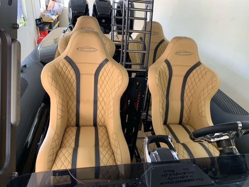 Slide: The Image of Luxurious interior of a 2018 Bernico RX10 with tan leather seats and steering wheel. - 8