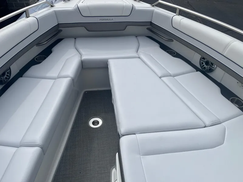 Slide: The Image of 2022 Formula 330 Crossover Bowrider I/O interior with spacious seating and modern design. - 12