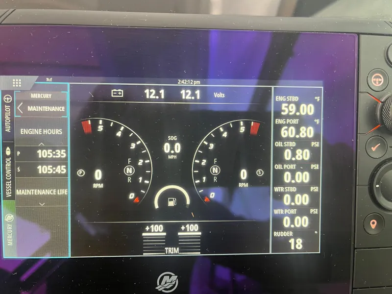 Slide: The Image of Dashboard display of a 2022 Formula 330 Crossover Bowrider I/O showing engine metrics and maintenance data. - 13