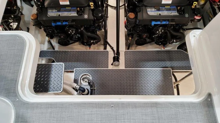 Slide: The Image of Engine compartment of 2022 Formula 330 Crossover Bowrider I/O with dual engines. - 37