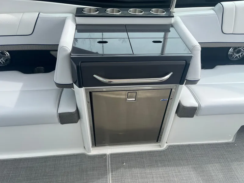 Slide: The Image of 2022 Formula 330 Crossover Bowrider I/O interior with sleek seating and built-in storage. - 7