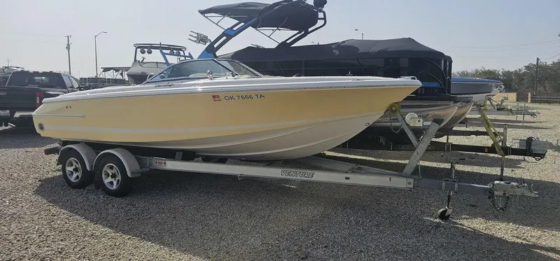 Slide: The Image of 2007 Chris-Craft Launch 22 boat on trailer, parked outdoors. - 1