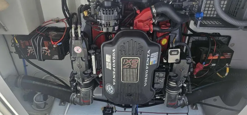 Slide: The Image of Engine compartment of a 2007 Chris-Craft Launch 22 boat, featuring a Volvo Penta engine. - 21