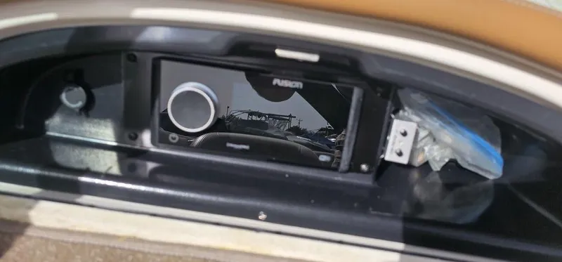 Slide: The Image of 2007 Chris-Craft Launch 22 dashboard with Fusion stereo system. - 24