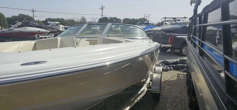 Slide: The Image of 2007 Chris-Craft Launch 22 boat on trailer in outdoor lot. - 9