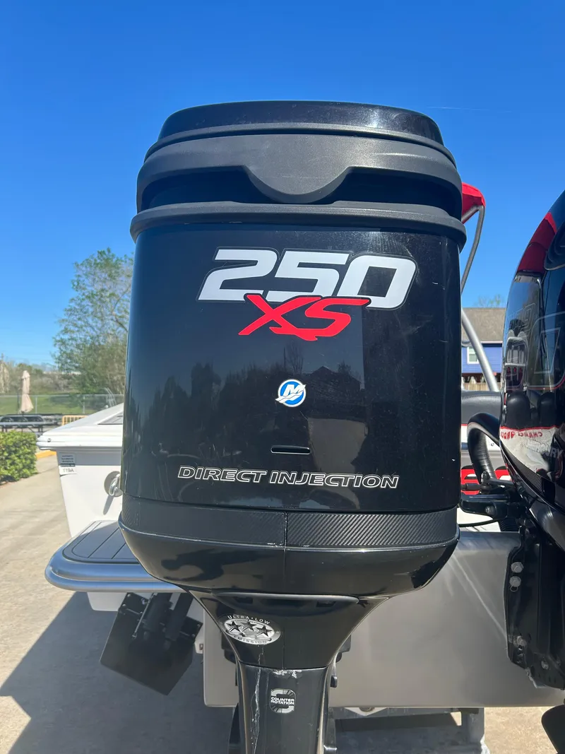 Slide: The Image of 2009 Concept 30 SD outboard motor, 250 XS Direct Injection, black with red and white lettering. - 11