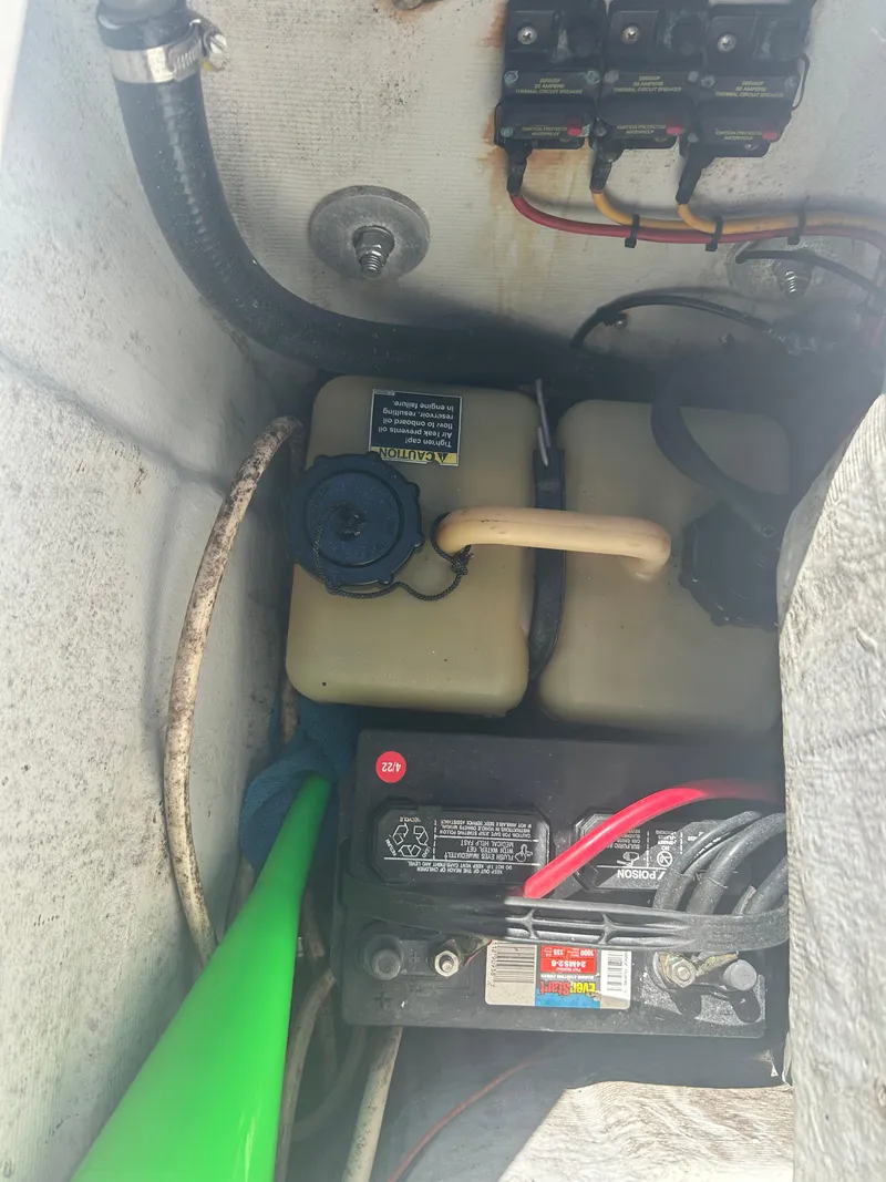 Slide: The Image of 2009 Concept 30 SD boat battery compartment with wiring and components. - 24