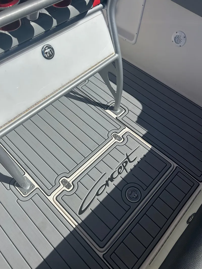 Slide: The Image of Boat deck with Concept 30 SD logo, featuring sleek gray design, 2009 model. - 27