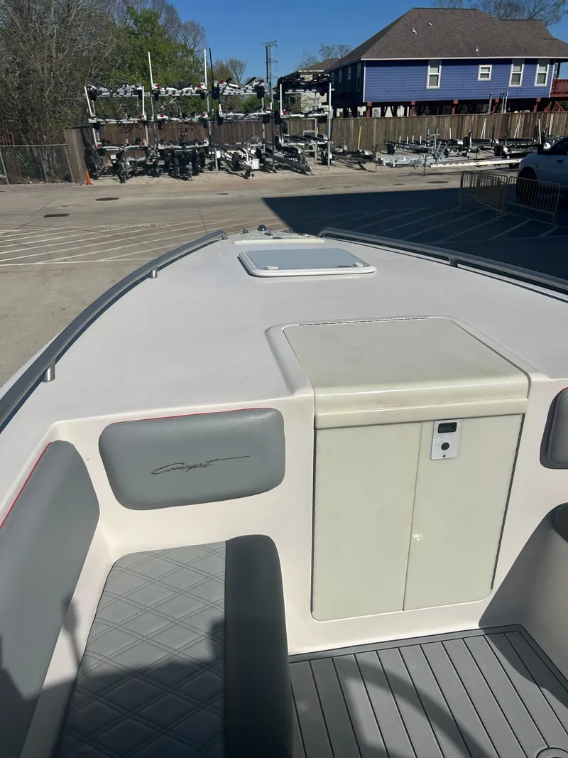 Slide: The Image of 2009 Concept 30 SD boat deck with storage compartment, docked outdoors. - 40
