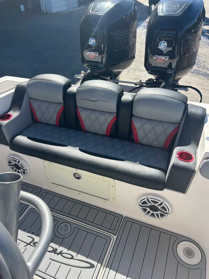 Slide: The Image of 2009 Concept 30 SD boat with dual Mercury engines and cushioned seating. - 44