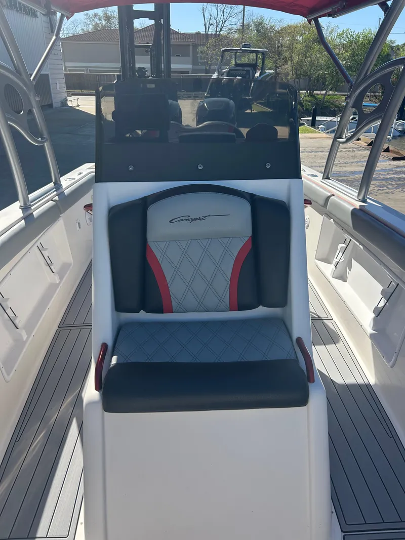 Slide: The Image of Center console of 2009 Concept 30 SD boat with cushioned seating. - 48