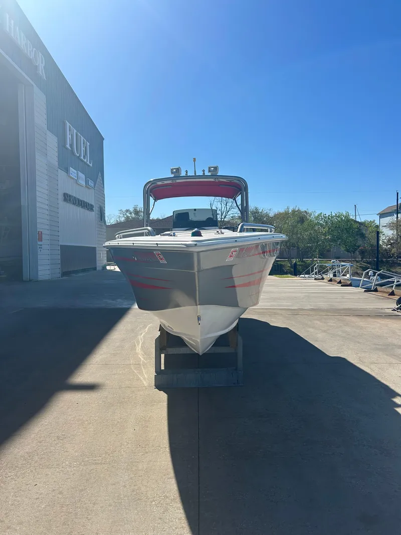 Slide: The Image of 2009 Concept 30 SD boat on display outside a building under clear blue sky. - 9