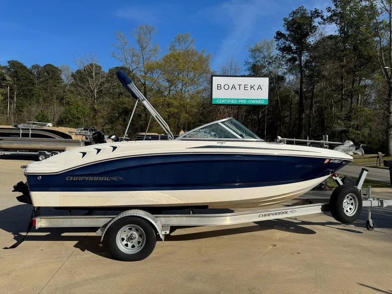 Slide: The Image of 2017 Chaparral 18 H20 Ski & Fish boat on trailer, outdoors at Boateka dealership. - 2