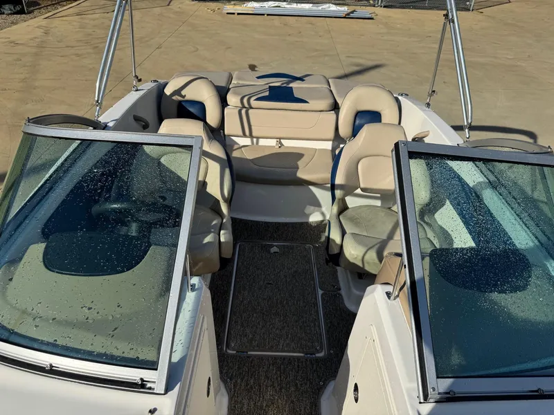 Slide: The Image of 2017 Chaparral 18 H20 Ski & Fish boat interior with seating and windshield. - 6