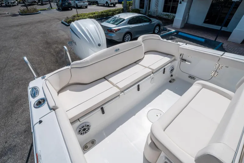 Slide: The Image of 2025 Sea Hunt Ultra 255 SE boat interior with spacious seating and modern design. - 11