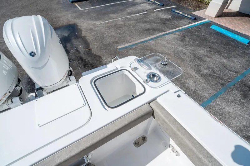 Slide: The Image of 2025 Sea Hunt Gamefish 27 FS boat with dual engines and fishing station. - 15