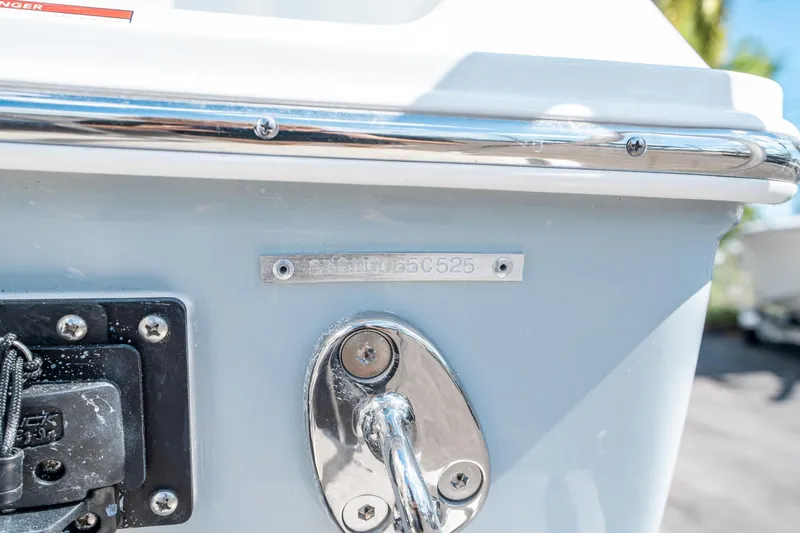 Slide: The Image of 2025 Sea Hunt Gamefish 27 FS boat detail with serial number plate and hardware. - 41