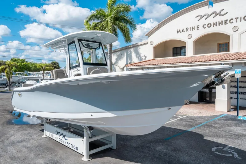 Slide: The Image of 2025 Sea Hunt Gamefish 27 FS boat displayed at Marine Connection dealership. - 8