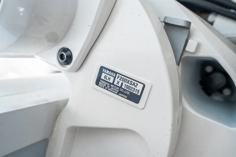 Slide: The Image of Close-up of Yamaha F200XSA2 engine label on 2025 Sea Hunt Gamefish 27 FS boat. - 40