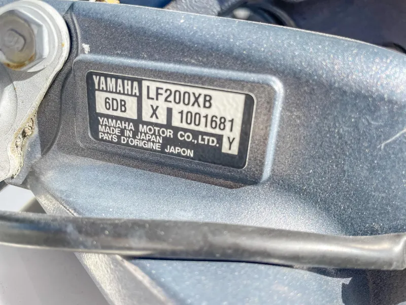 Slide: The Image of Yamaha LF200XB engine label on 2016 Cobia 277 CC boat, made in Japan. - 22