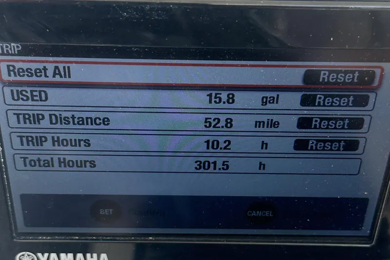 Slide: The Image of Yamaha display showing trip data: 15.8 gallons used, 52.8 miles, 10.2 hours, 301.5 total hours. - 18