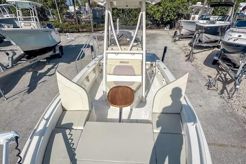 Slide: The Image of 2017 Pathfinder 2600 TRS boat with seating and console, parked on a lot. - 24