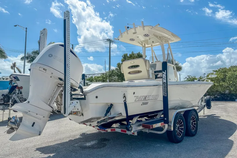 Slide: The Image of 2017 Pathfinder 2600 TRS boat on trailer under clear blue sky. - 5