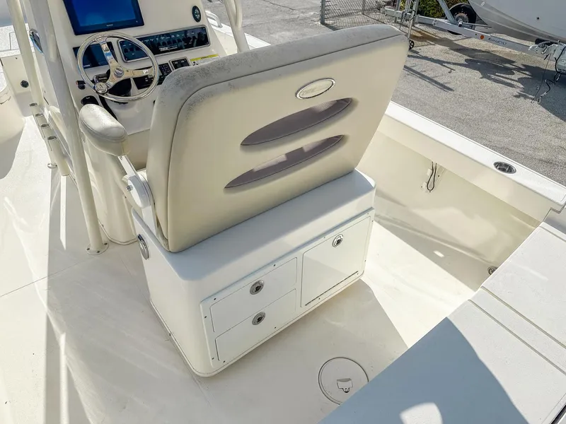 Slide: The Image of 2017 Pathfinder 2600 TRS boat interior with helm and seating area. - 9