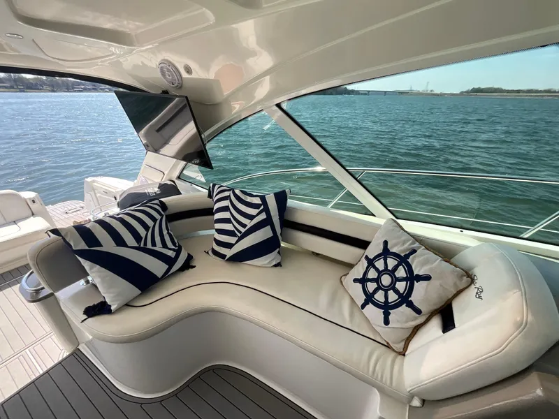 Slide: The Image of Luxurious 2006 Sea Ray 48 Sundancer yacht interior with nautical-themed cushions. - 22