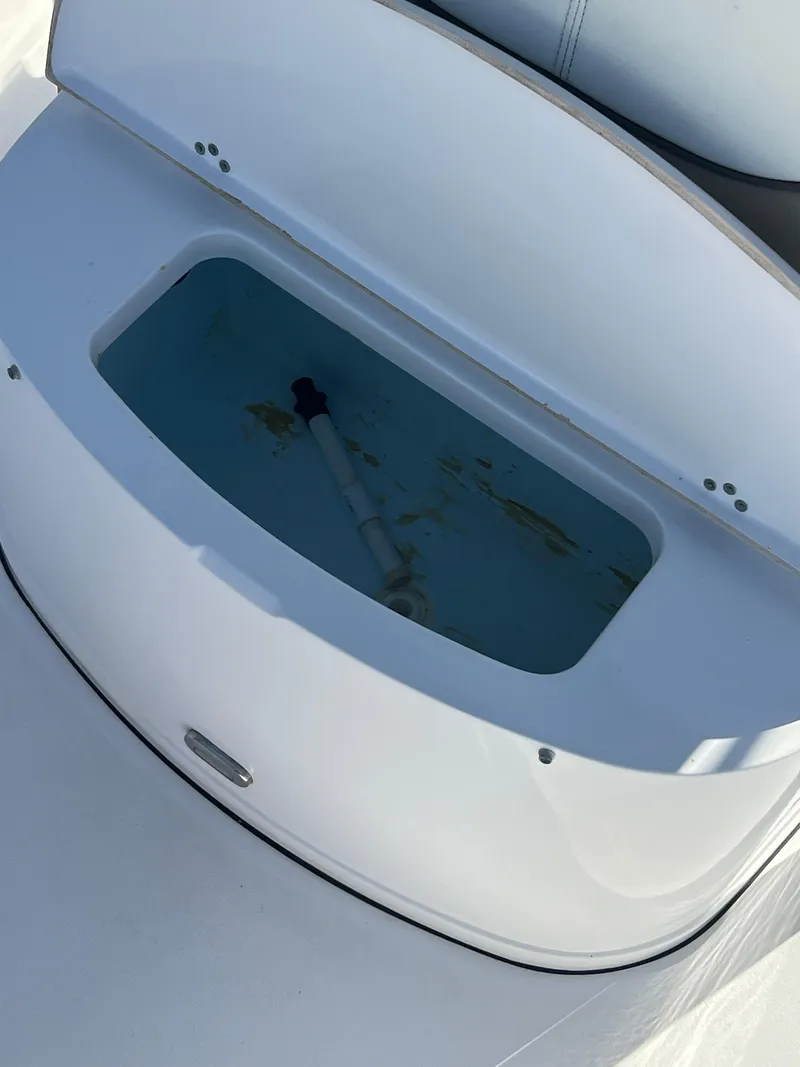 Slide: The Image of 2014 Sportsman Masters 247 Bay Boat livewell with open lid. - 18