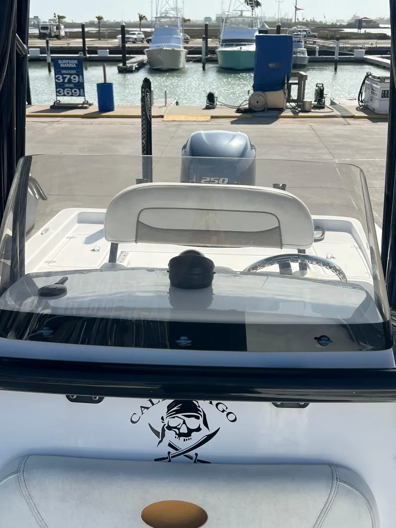 Slide: The Image of 2014 Sportsman Masters 247 Bay Boat at marina dock, rear view. - 19