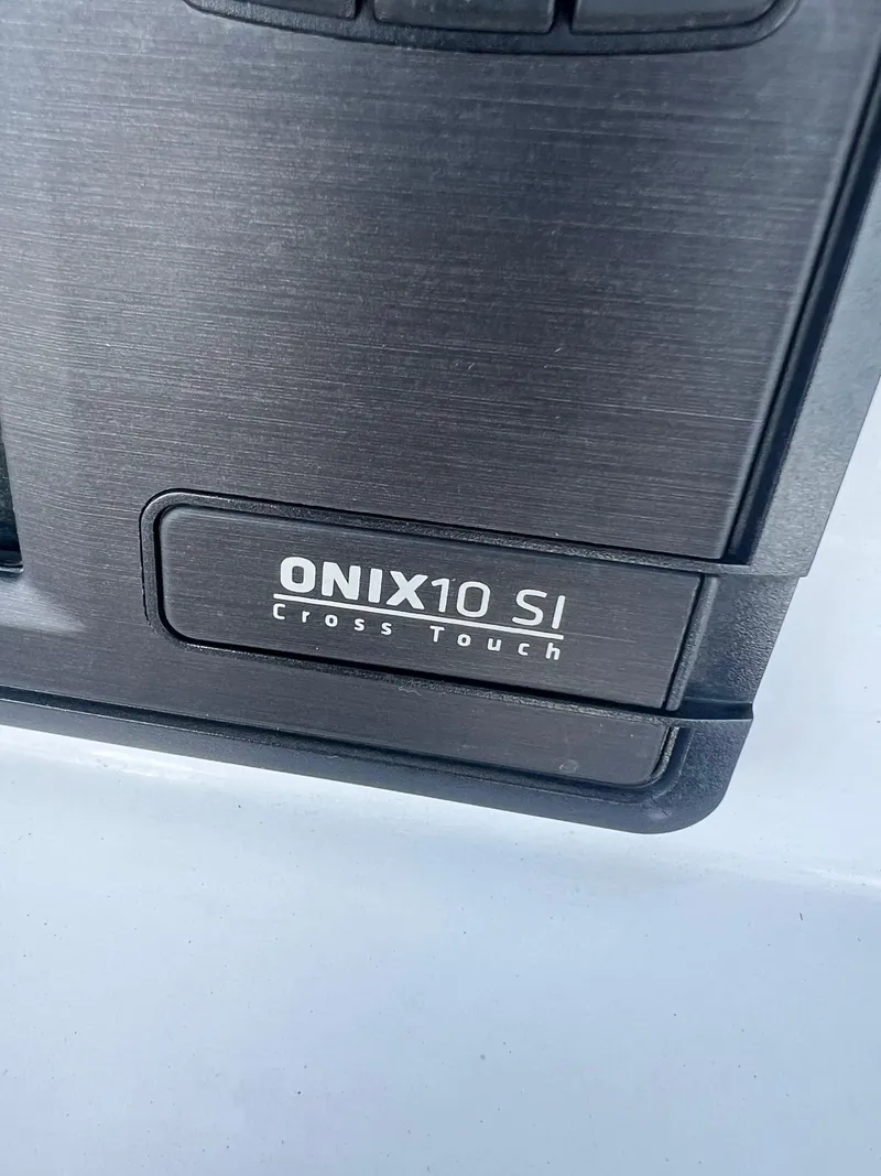 Slide: The Image of ONIX10 SI Cross Touch display on 2014 Sportsman Masters 247 Bay Boat. - 23